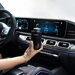 Car Scenting - woman holding Lèlior diffuser inside front of vehicle | Lèlior House of Fragrance