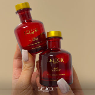 woman's hands holding two bottles of 540 fragrance by Lèlior