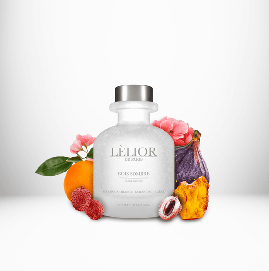 BOIS SOMBRE Fragrance Oil displayed with surrounding fragrance notes, featuring a 50mL clear front glass bottle that highlights the rich, aromatic blend.