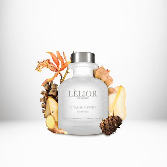 CHAMPS-ELYSEES Fragrance Oil displayed with surrounding fragrance notes, featuring a 50mL clear front glass bottle that highlights the rich, aromatic blend.