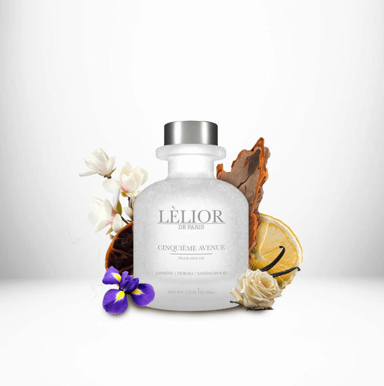 CINQUIEME AVENUE Fragrance Oil displayed with surrounding fragrance notes, featuring a 50mL clear front glass bottle that highlights the rich, aromatic blend.