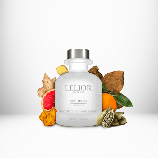 NUMERO UN Fragrance Oil displayed with surrounding fragrance notes, featuring a 50mL clear front glass bottle that highlights the rich, aromatic blend.