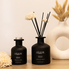 About Us Header Image - Lèlior de Paris reed diffuser and fragrance on table next to vase 